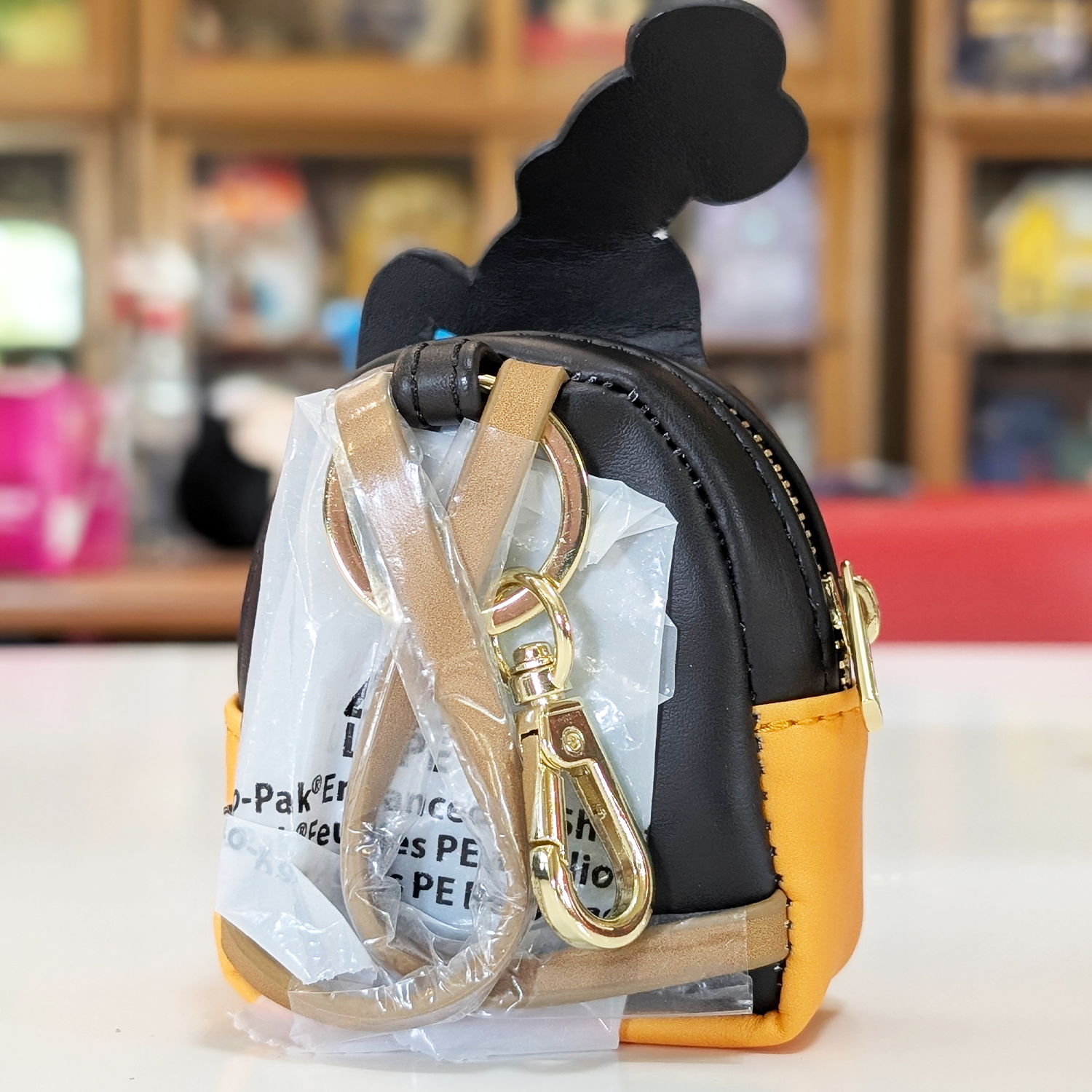 Mini-Loungefly Disney Mickey Mouse Sensational Six Cosplay U-PICK Bag Charm Key Chains new in box by Loungefly with black and yellow design