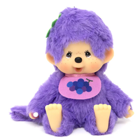 Sekiguchi Monchhichi plush in grape purple with soft fur and bib featuring grape design, about 5 inches tall.