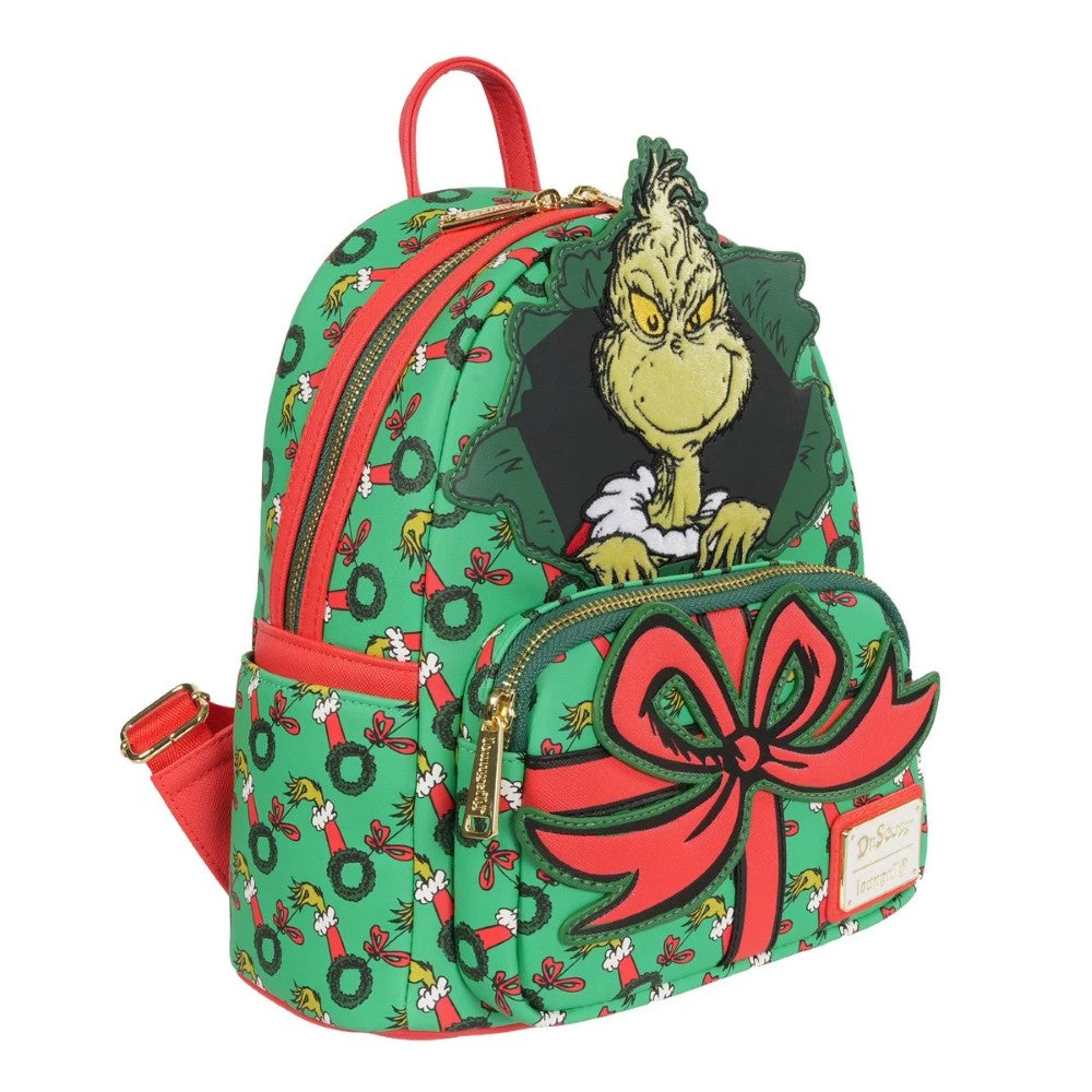 Loungefly How the Grinch Stole Christmas mini-backpack with Grinch and red bow on green wreath pattern