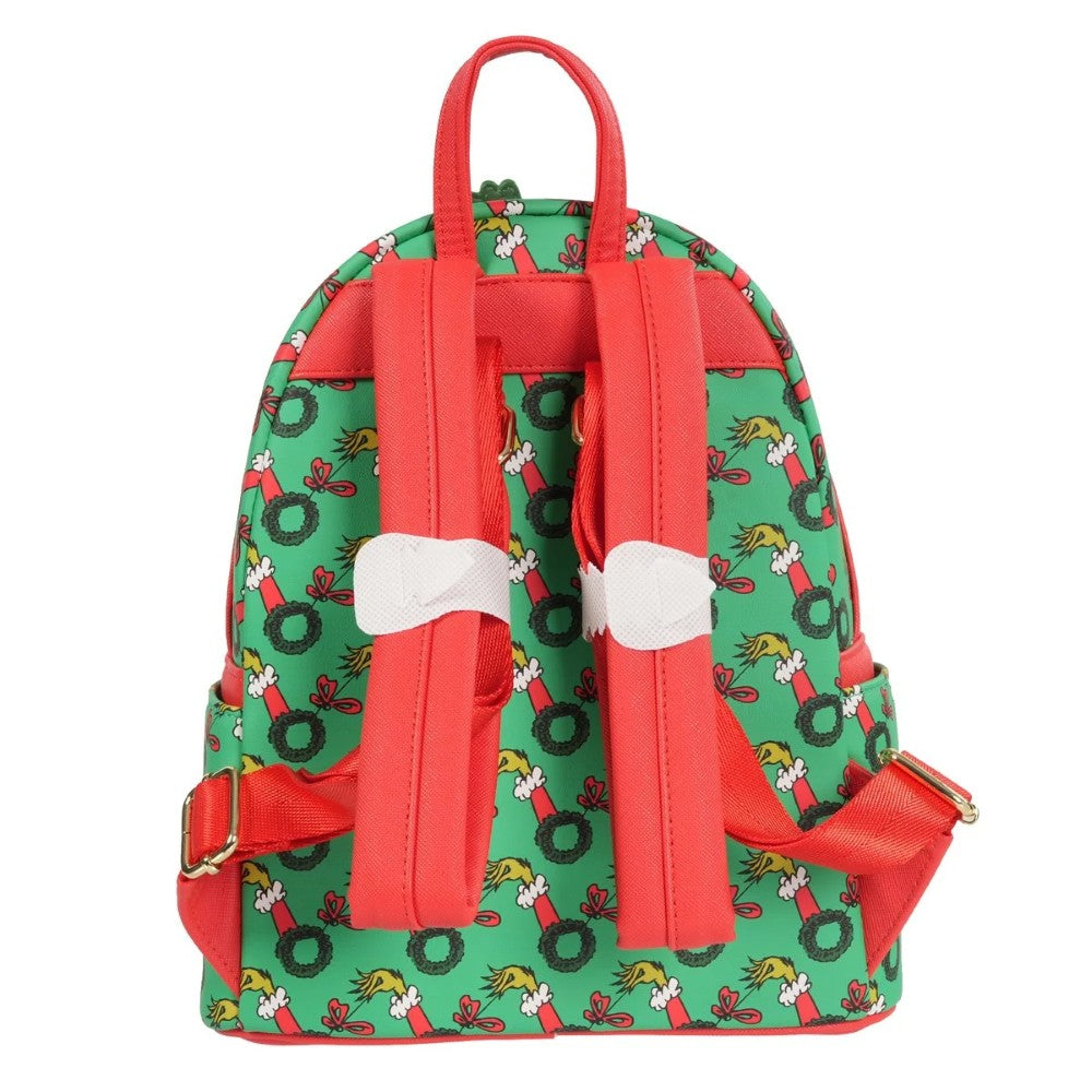 Loungefly How the Grinch Stole Christmas mini-backpack with red straps and green wreath pattern on back