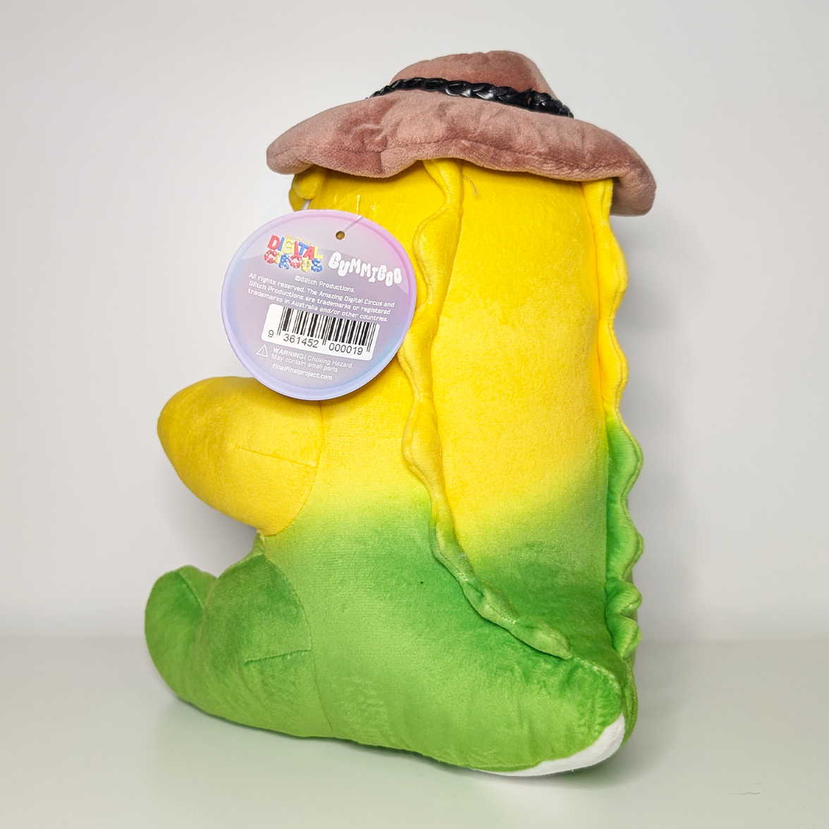 Gummigoo Plush The Amazing Digital Circus 10.5" Soft Plush Toy New With Tags by Glitch in yellow and green gradient with hat accessory
