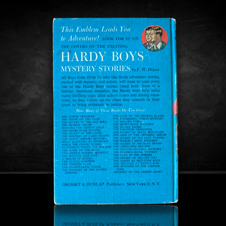 Back cover of 1959 Hardy Boys book The House on the Cliff listing series titles by Grosset & Dunlap
