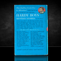 Back cover of 1959 Hardy Boys book The House on the Cliff listing series titles by Grosset & Dunlap