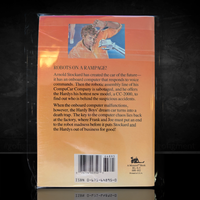 Back cover of vintage 1987 Hardy Boys paperback showing summary of mystery involving robotic sabotage and danger.