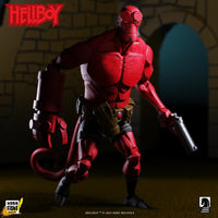 Hellboy 1:12 Scale Action Figure Wave 1 (Box Full of Evil) by Boss Fight Studio posed with gun by Go Figment