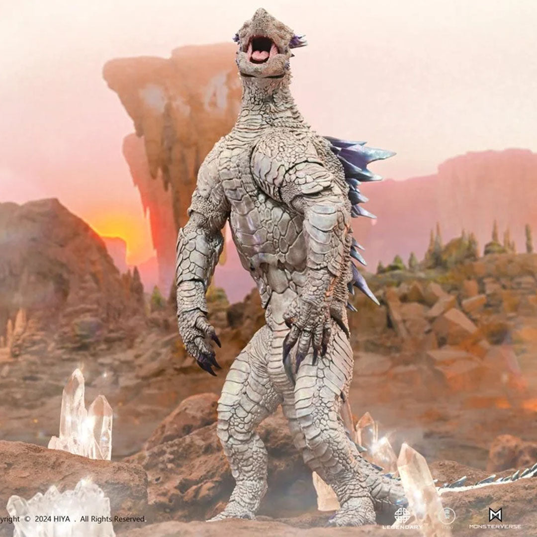 Hiya Toys Shimo Godzilla action figure standing in a rocky, glowing landscape with crystal formations around it