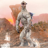 Hiya Toys Shimo Godzilla action figure standing in a rocky, glowing landscape with crystal formations around it