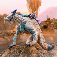Hiya Toys Shimo Godzilla action figure posed on rocky terrain with detailed icy blue spikes and textured skin