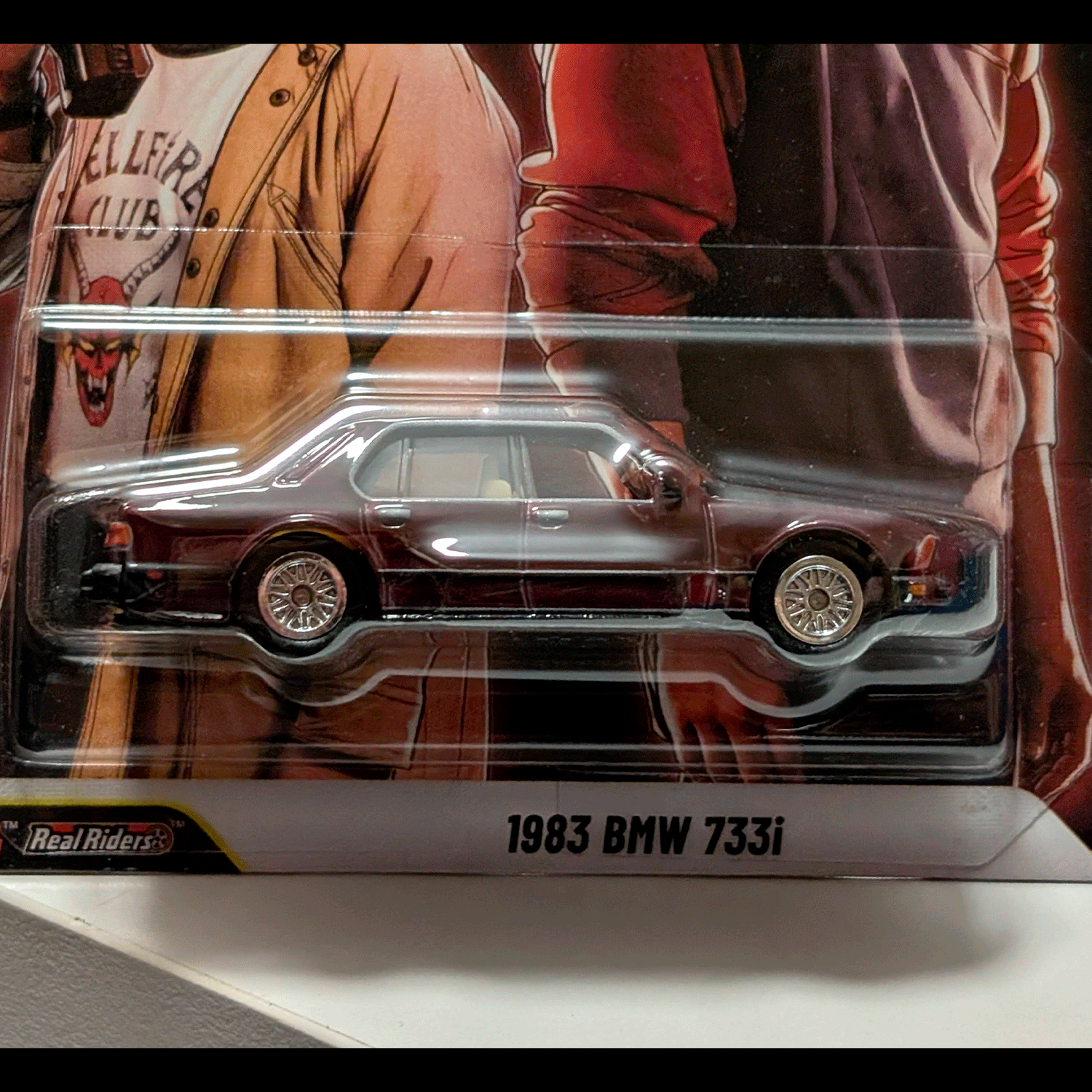 Mattel Hot Wheels 1983 BMW 733i Stranger Things Pop Culture 2026 die-cast car side view in package