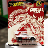 Mattel Hot Wheels Premium Nissan Skyline GT-R BNR34 Godzilla Pop Culture 2026 die-cast car front view in package