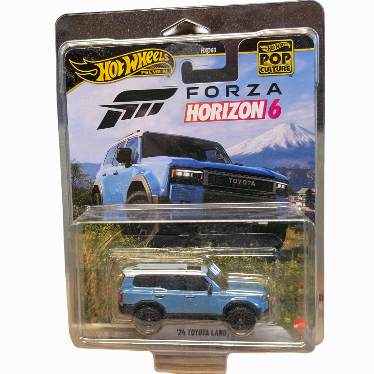 24 Toyota Land Cruiser FORZA 1:64 Hot Wheels Pop Culture Mini-Vehicle Mattel blue die-cast vehicle in package