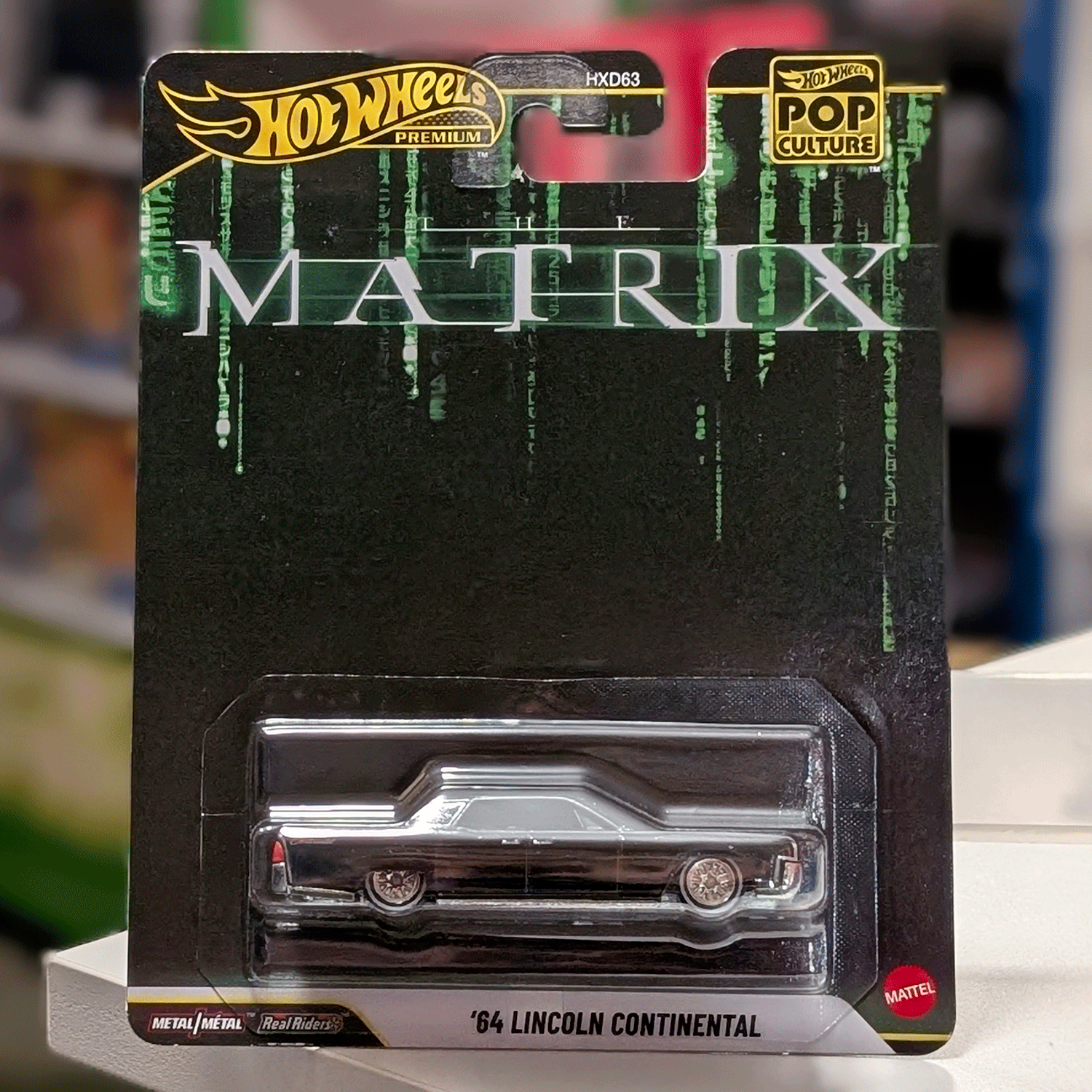 Mattel Hot Wheels Premium ’64 Lincoln Continental die-cast vehicle in The Matrix Pop Culture 2026 packaging front view