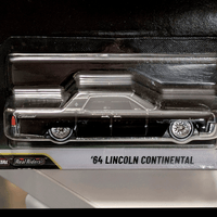 Mattel Hot Wheels ’64 Lincoln Continental die-cast model car in black with detailed wheels side view in packaging