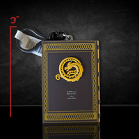 How to Train Your Dragon 3D Book of Dragons PVC foam bag clip showing gold dragon emblem on black cover