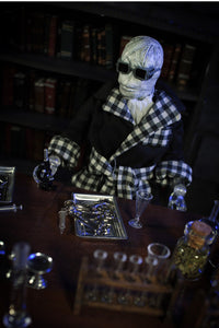 The Invisible Man Retro Style Articulated Mego Action Figure 8 inch dressed in plaid robe with scientific tools on table