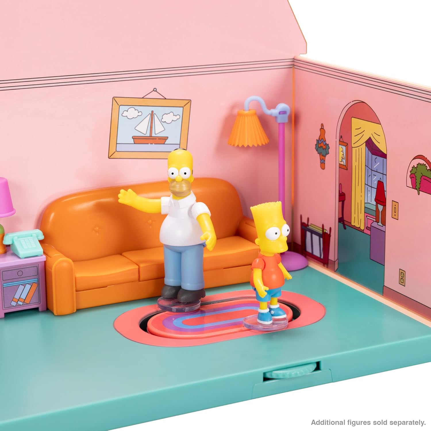 Miniature scene showing Homer and Bart Simpson figures in a colorful living room diorama with orange couch and wall decorations