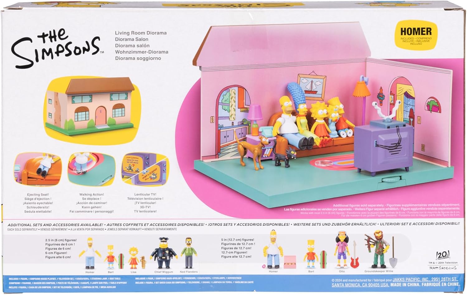 Simpsons living room diorama with Homer, Marge, Bart, Lisa, Maggie, dog, cat, and purple TV set.