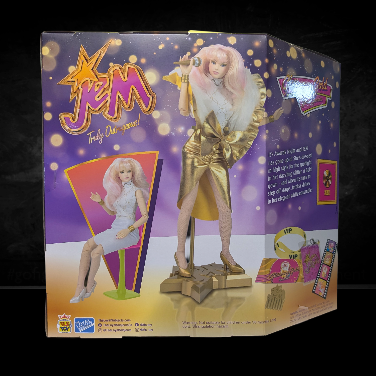Jem and the Holograms Glitter and Gold Jem Jerrica 12-Inch Fashion Doll The Loyal Subjects 2025 in gold outfit with microphone stand