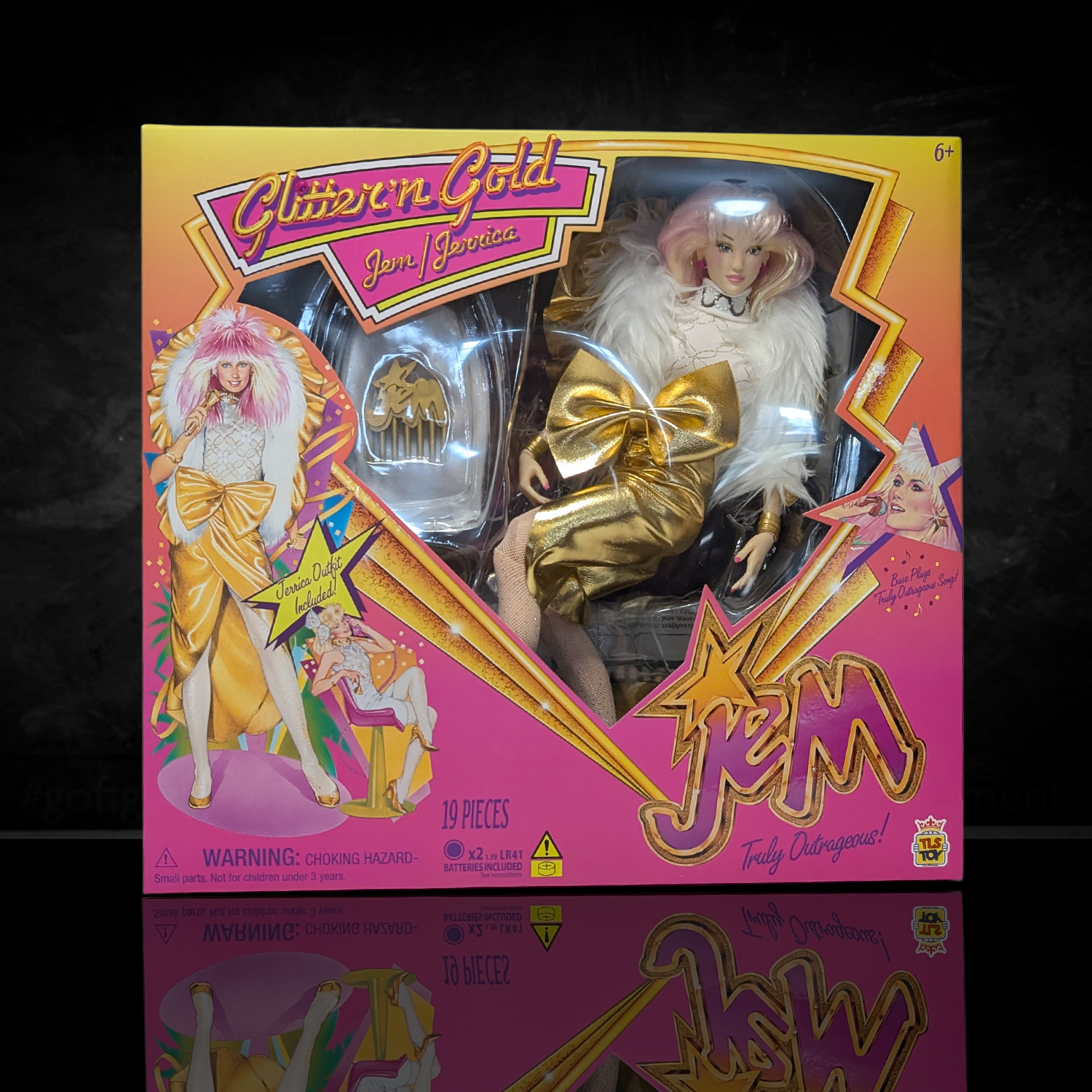 Jem and the Holograms Glitter and Gold Jem Jerrica 12-Inch Fashion Doll The Loyal Subjects 2025 in gold outfit with white fur collar in box