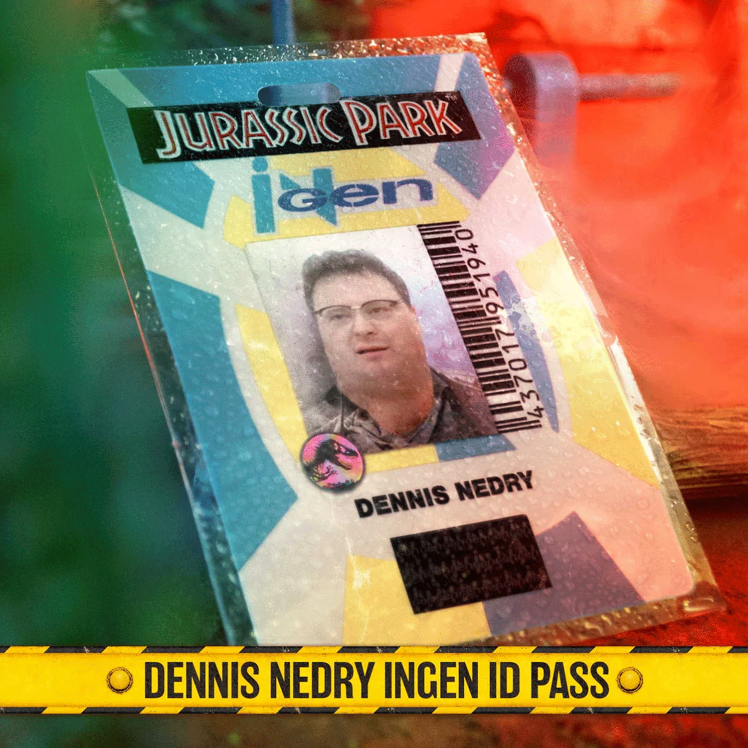 Doctor Collector Jurassic Park Dennis Nedry Ingen identification badge with barcode on transparent holder against colorful background