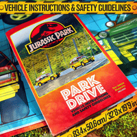Doctor Collector Jurassic Park Park Drive guidebook with vintage yellow tour vehicles and safety instructions on colorful background