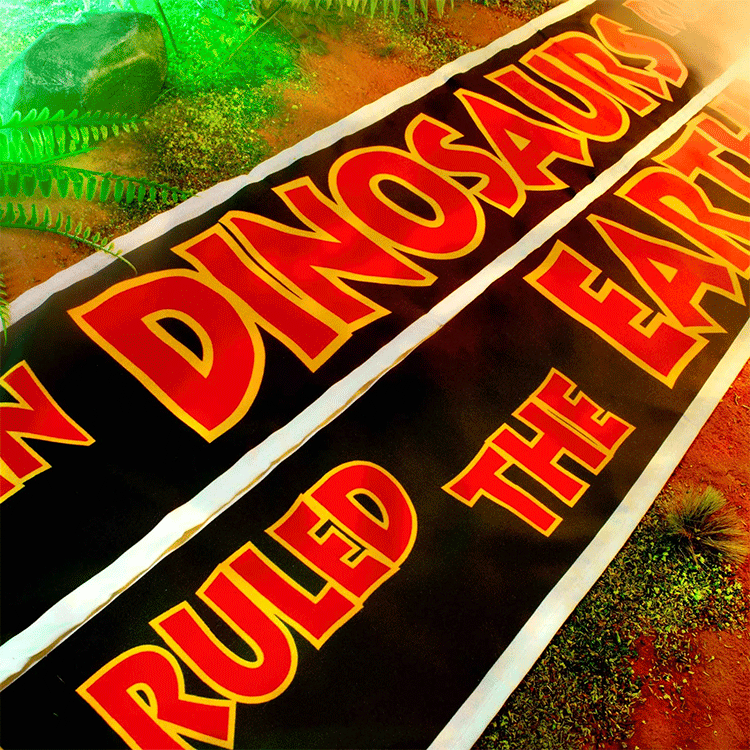 Doctor Collector Jurassic Park bold banner reading Dinosaurs Ruled the Earth with vibrant red and yellow lettering on black background