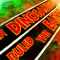 Doctor Collector Jurassic Park bold banner reading Dinosaurs Ruled the Earth with vibrant red and yellow lettering on black background
