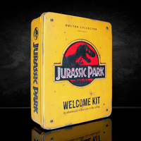 Doctor Collector Jurassic Park Welcome Kit tin box with vintage yellow design and iconic dinosaur logo on front cover