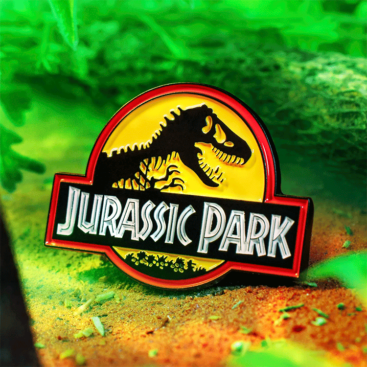 Doctor Collector Jurassic Park enamel pin featuring iconic dinosaur skeleton logo in red and yellow colors