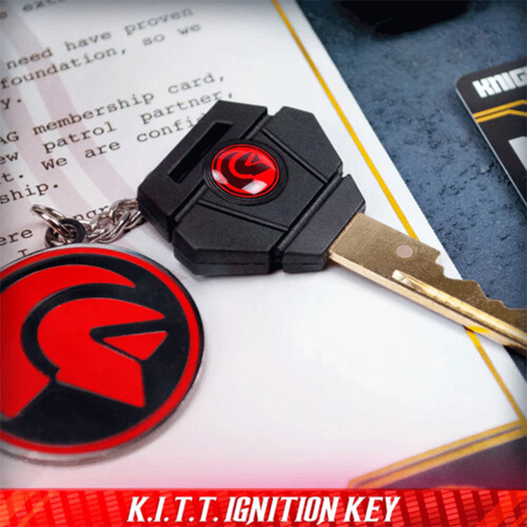 Close-up of Knight Rider K.I.T.T. ignition key and F.L.A.G. keychain from Doctor Collector collectible set