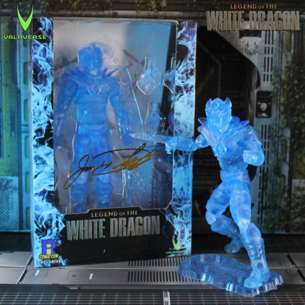 Blue translucent White Dragon figure in a signed box beside a matching posed figure