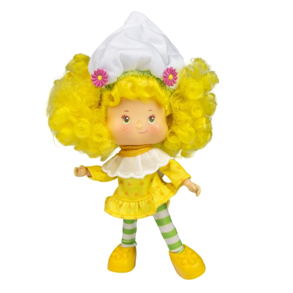 5 1/2-inch Loyal Subjects Strawberry Shortcake Lemon Meringue fashion doll with yellow hair and striped leggings