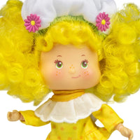 Strawberry Shortcake Lemon Meringue 5 1/2-inch fashion doll with curly yellow hair by Loyal Subjects