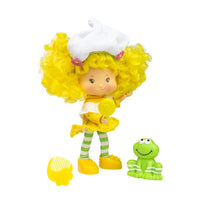 5 1/2-inch Loyal Subjects Strawberry Shortcake Lemon Meringue fashion doll with frog and comb accessories
