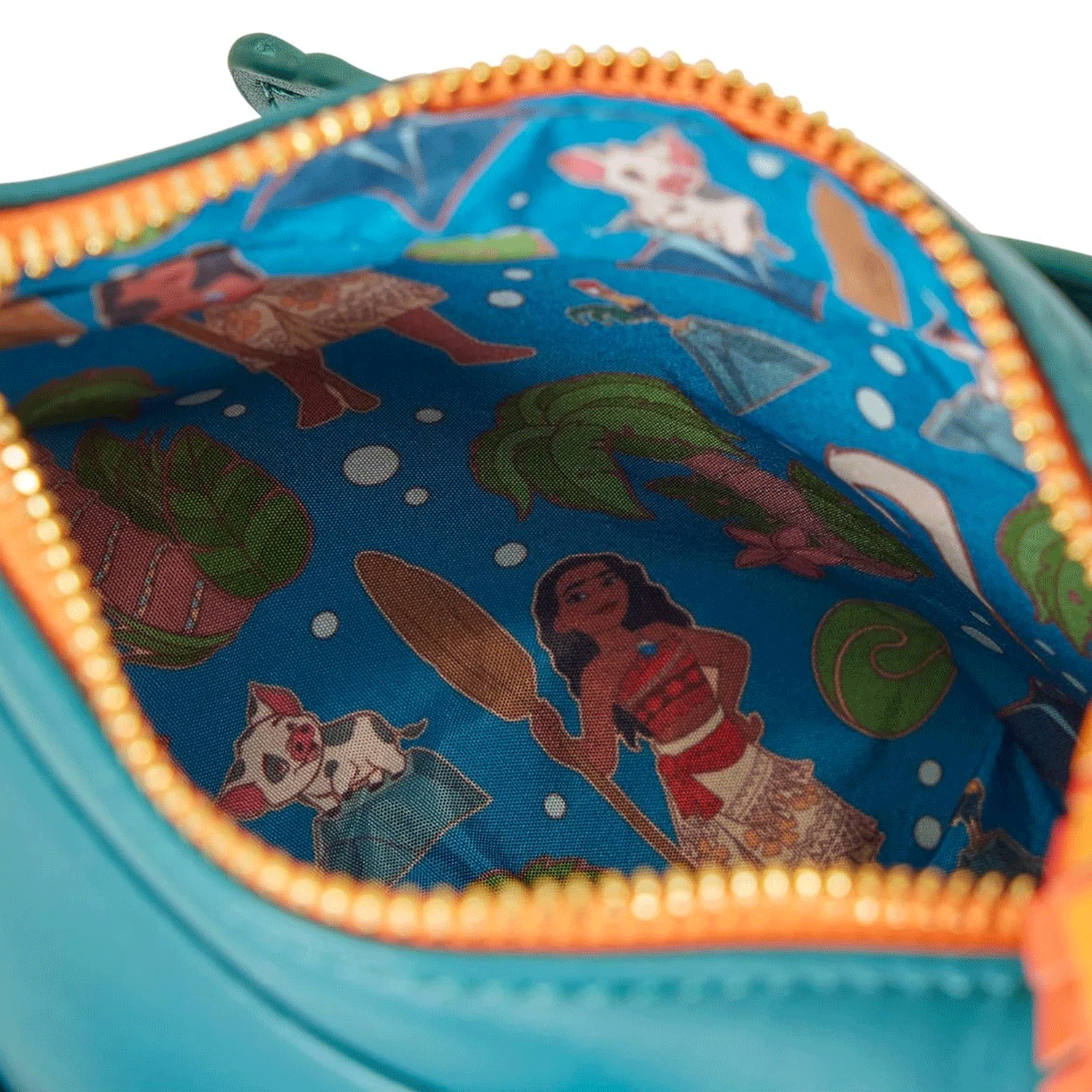 Interior lining of Loungefly Moana HeiHei crossbody bag featuring colorful character and island print design