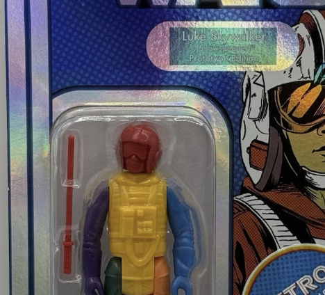 Go Figment Star Wars Retro Collection Prototype Luke Skywalker action figure in multicolor design with red lightsaber on blue card back