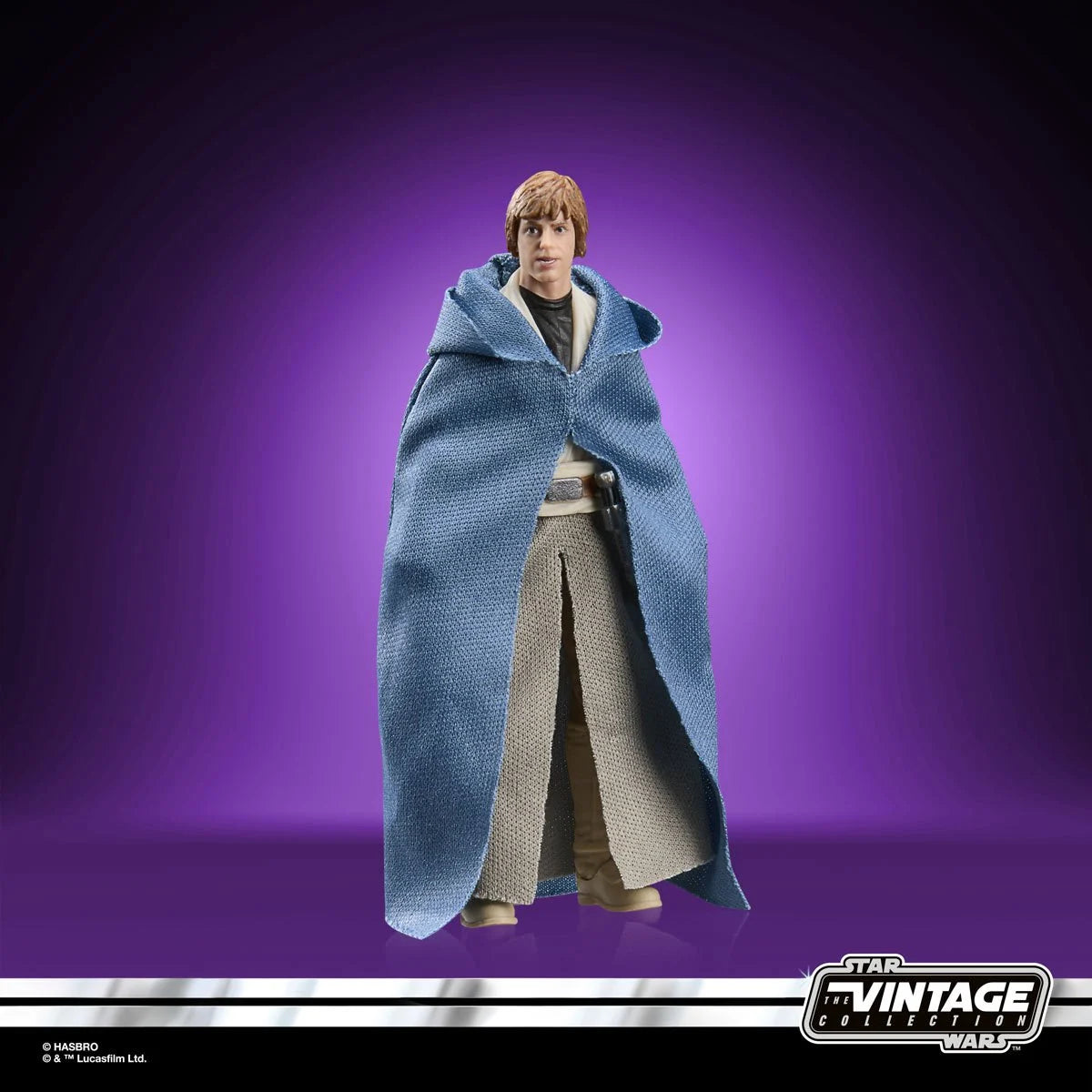 Luuke Skywalker Star Wars The Vintage Collection Action Figure Hasbro New with fabric robes by Kenner standing on purple background