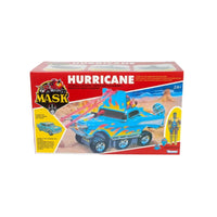 Vintage boxed toy vehicle with a colorful blue and orange off road design and character figureાન્ય