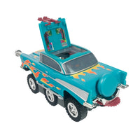 Turquoise six wheeled toy truck with orange flame decals and a raised rear hatch