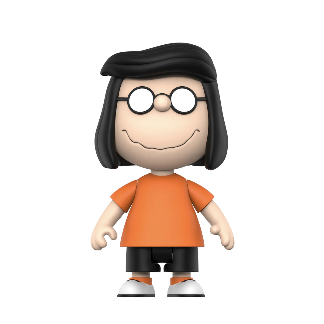 Figurine of a character with black hair, glasses, and an orange shirt on a white background