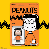 Peanuts figurine packaging with character design on a yellow background
