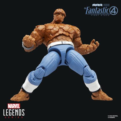 Marvel Legends 6-inch The Thing action figure from Fantastic Four First Steps in wide stance with blue pants on black background