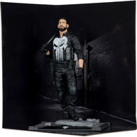 The Punisher - Marvel Studios 1:10 Scale Posed Figure Scene McFarlane Toys by Hasbro in detailed black tactical gear.
