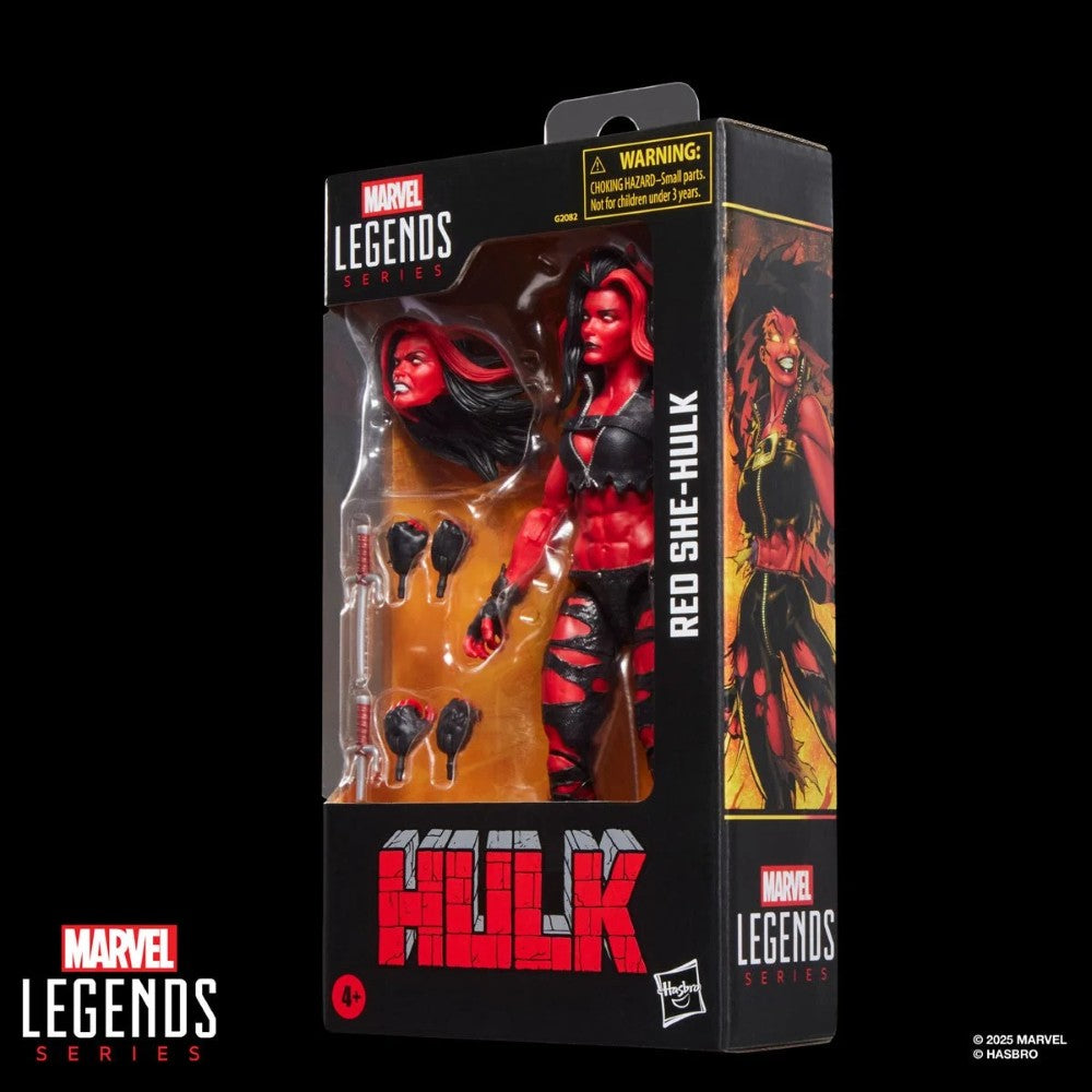 Hasbro Marvel Legends 6-inch Red She-Hulk figure with fiery red skin, torn outfit, extra hands, and interchangeable head in packaging