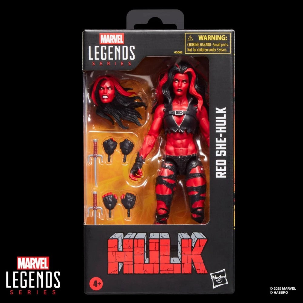Hasbro Marvel Legends 6-inch Red She-Hulk figure with alternate head, multiple hands, and weapons in display packaging