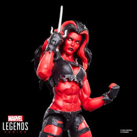 Hasbro Marvel Legends 6-inch Red She-Hulk figure with muscular red skin, black torn outfit, and sword accessory on black background