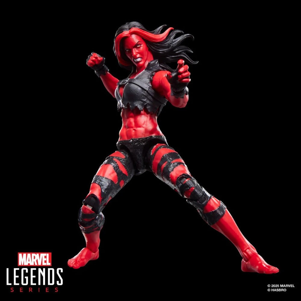 Hasbro Marvel Legends 6-inch Red She-Hulk figure in dynamic pose with red and black outfit on black background