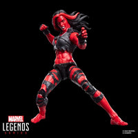 Hasbro Marvel Legends 6-inch Red She-Hulk figure in dynamic pose with red and black outfit on black background