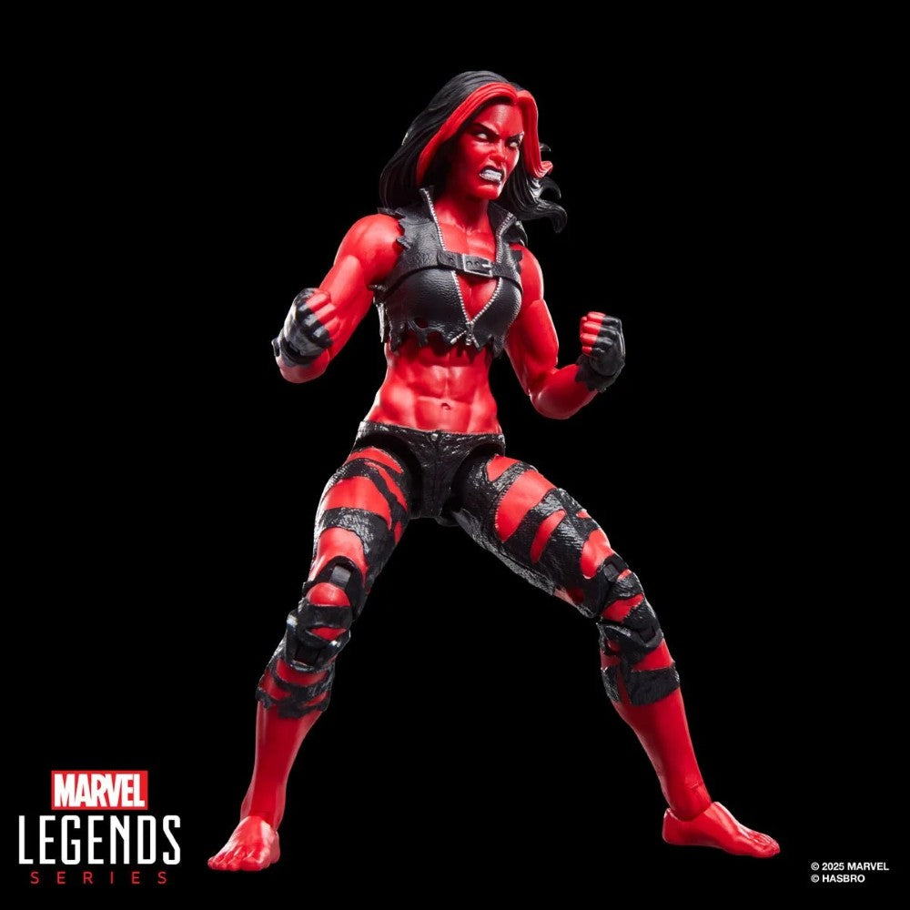 Hasbro Marvel Legends 6-inch Red She-Hulk figure with fierce expression and shredded black outfit on black background