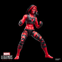 Hasbro Marvel Legends 6-inch Red She-Hulk figure with fierce expression and shredded black outfit on black background